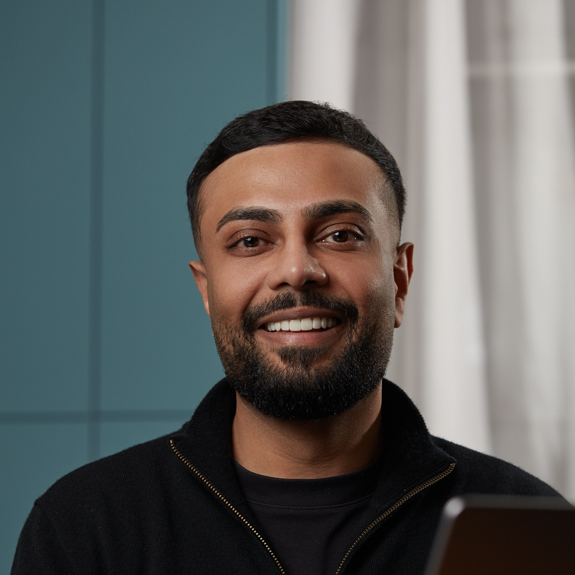 Headshot portrait of Dru Patel, Growth Marketing Manager at Talking Talent